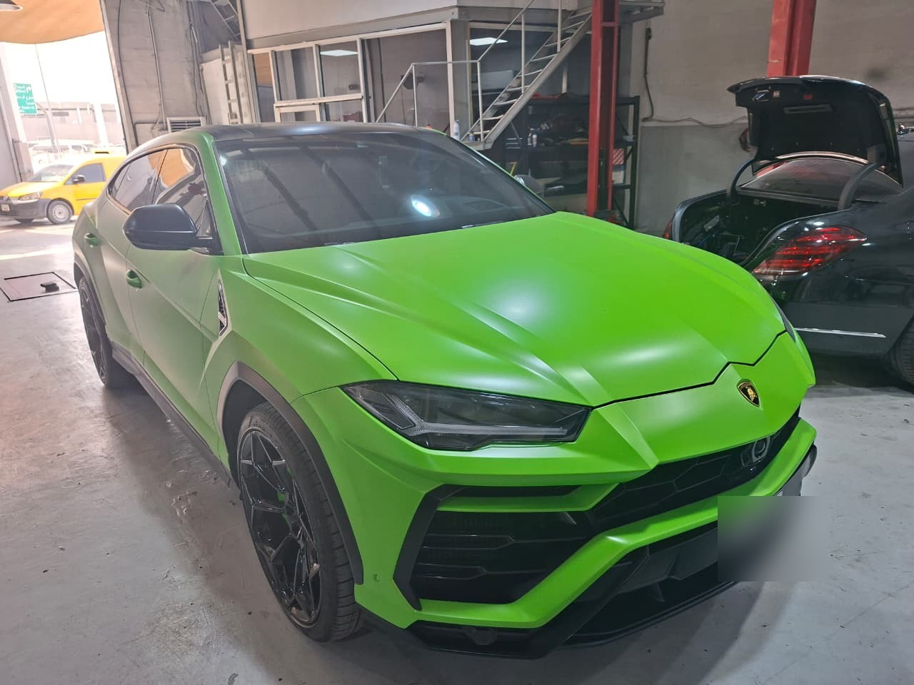 Green Lamborghini front detail